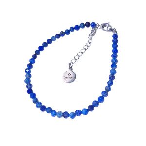 Armband met donkerzilverkleurig verlengkettinkje en lapis lazuli kraaltjes.