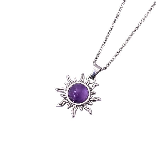 Zilveren stainless steel ketting met een zon hanger met amethist steen.