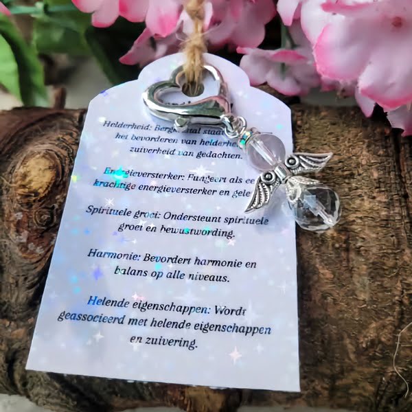 Beschermengel bergkristal met kaartje met werking van de steen.