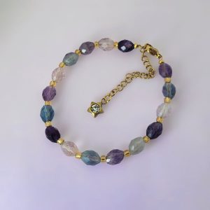 Goudkleurige rvs armband met gekleurde fluoriet kralen