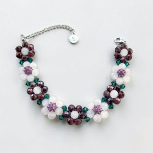 Armband met granaat en rozenkwarts bloemetjes + rhinestone en Swarovski