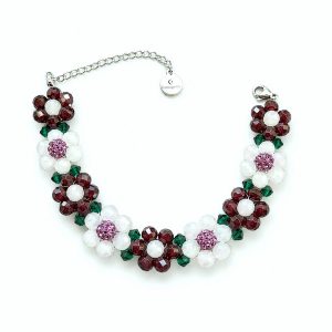 Stainless steel armband met verlengkettinkje en bloemetjes van granaat, rozenkwarts en rhinestone + Swarovski kraaltjes